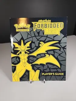 Pokemon TCG Sun & Moon Forbidden Light Players Guide Book - Image 1