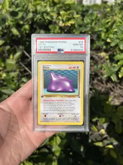 1999 POKEMON FOSSIL 1ST ED #3 DITTO-NON HOLO PSA 10 - Image 1