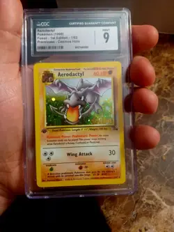 Pokemon Aerodactyl Fossil 1st Edition Prerelease Cosmos Holo CGC 9 1/62 - Image 1