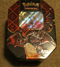 Pokemon Scarlet & Violet Paldean Fates Charizard Tin - Image 1