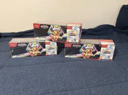Pokemon Prismatic Evolutions Booster Bundle Surprise Box TCG Eevee - Image 1