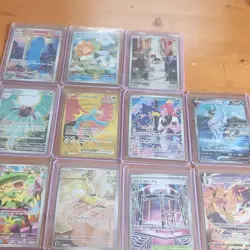 POKEMON TCG 11 CARD LOT INCLUDING CARDS FROM THE NEWEST SETS - Image 1