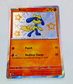 Pokemon Card TCG - Riolu 173/091 - Paldean Fates - Baby Shiny Rare - NM - Image 1
