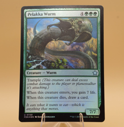 Pelakka Wurm | 720 | Uncommon | Foil | Foundations | MTG | See Store Sales - Image 1
