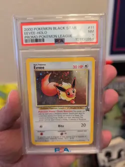 Eevee #11 Black Star Promo Holo Pokemon - PSA 7 NM Swirl - Image 1