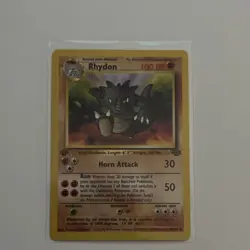 Pokemon Rhydon Jungle 1st Edition 45/64 100 HP Uncommon Horn Attack Ram Card - Image 1