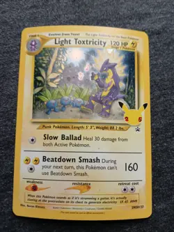 Pokemon TCG Light Toxtricity SWSH137 Celebrations Black Star Promo - Image 1