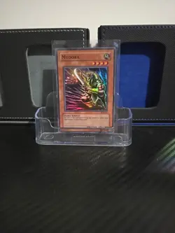 Mudora Yu-Gi-Oh DCR-076 Super Rare - Image 1