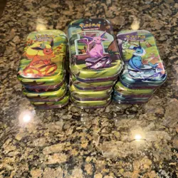 Pokemon TCG Prismatic Evolutions Mini Tin Lot of 10-New/Factory Sealed - Image 1