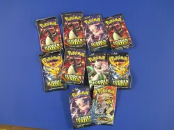 Pokemon collection...2 books, 4 older empty ETB -lots older cards in sleeves- - Image 1