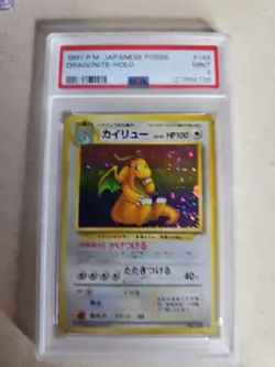 1997 POKEMON JAPANESE FOSSIL #149 DRAGONITE-HOLO PSA 9 MINT SWIRL - Image 1