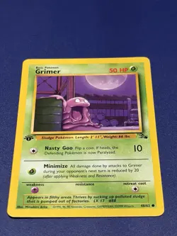 Pokemon TCG Grimer Fossil, 1st Edition Common Card 48/62 LP Condition - Image 1