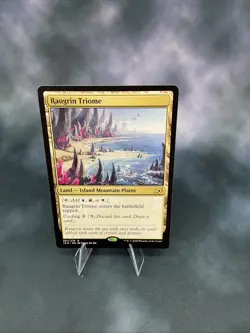 Raugrin Triome Ikoria: Lair of Behemoths Regular - Image 1