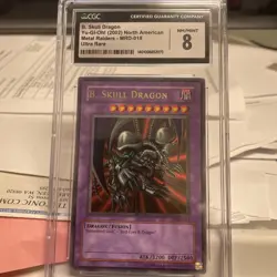 Yu-Gi-Oh! 2002 Black Skull Dragon Metal Raiders Ultra Rare MRD-018 CGC 8 - Image 1