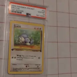 Team Rocket Dratini 53/82 1st Edition PSA 10 Pokemon - Image 1