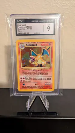 CGC 9 MINT — Charizard Holo 4/102 — 1999 Pokemon Base Set Unlimited — WOTC - Image 1