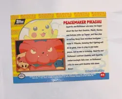 1999 Topps Pokemon First Movie Peacemaker Pikachu Silver Foil #46 Black Logo - Image 2