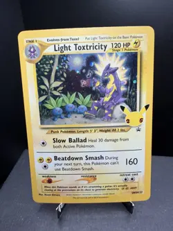 Pokemon TCG Celebrations Light Toxtricity SWSH137 Black Star Promo Holo SWIRL NM - Image 1
