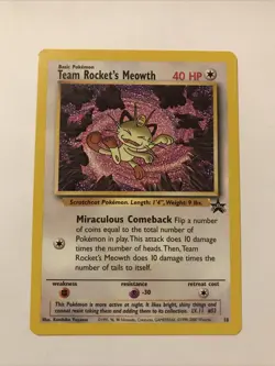 Team Rocket's Meowth Black Star Promo Pokemon Card #18 - Image 1