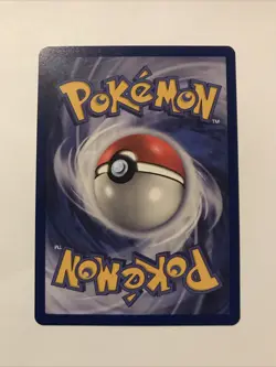 Team Rocket's Meowth Black Star Promo Pokemon Card #18 - Image 2