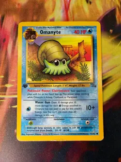 Omanyte 52/62 MP-DMG Common 1st Edition Fossil 1999 Pokemon TCG - Image 1