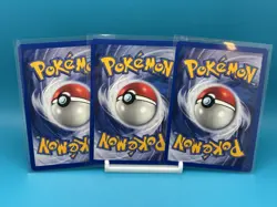 PACK FRESH 1999 POKEMON JUNGLE AND TEAM ROCKETS PSYDUCK NON-HOLO - Image 2