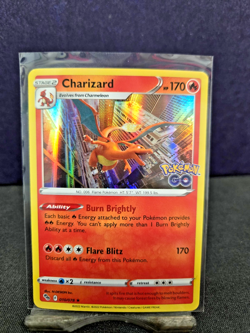 Charizard 10/78 Holo Rare NM Pokemon TCG - Pokemon Go English - Image 1