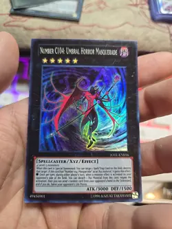 YuGiOh Number C104: Umbral Horror Masquerade Super Rare Unlimited JOTL-EN056 LP - Image 1