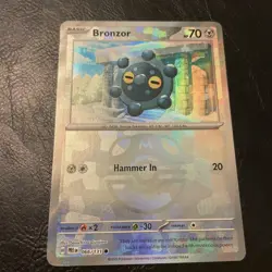 Bronzor Master Ball Holo 066/131 English Prismatic Evolutions Pokemon Card - Image 1