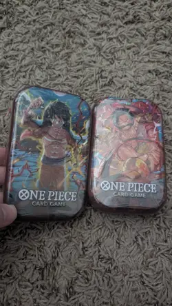 ONE PIECE TCG: Gol.D.Roger & Monkey.D.Luffy Tin Pack Set Vol. 1 Bundle - Image 1