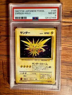 1997 Pokemon FOSSIL #145 ZAPDOS-HOLO Japanese PSA 8 - Image 1