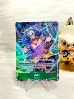 Adio OP09-023 SR (Alt Art) - One Piece TCG Emperors in the New World - English - Image 1