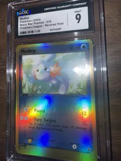 2003 Pokemon Mudkip Black Star Promos 010 Pokemon League Reverse Holo CGC 9 Mint - Image 1