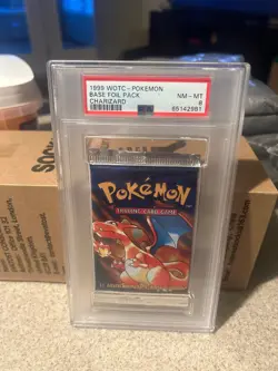 RARE VINTAGE 1999 WOTC - POKEMON BASE FOIL PACK CHARIZARD ART - PSA 8 - Image 1