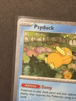 Psyduck Pokemon TCG #7 Mega Evolutions Black Star Promo Cosmos Holo w/swirl NM - Image 2