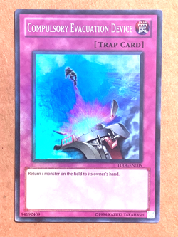 yugioh Compulsory Evacuation Device TU04-EN005 Super Rare Near Mint - Image 1