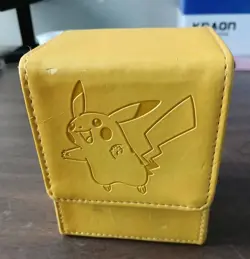 Ultra Pro Pokemon Pikachu Yellow Leatherette Flip Box Card Case w/ Pokemon Cards - Image 1