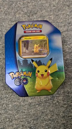 PIKACHU POKEMON GO TIN EMPTY W/ PROMO - Image 1