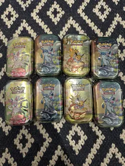 Pokemon TCG Prismatic Evolutions Mini Tins Set of 8 - NEW - SEALED 🔥 - Image 1
