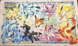 Pokemon Prismatic Evolutions - Eeveelutions Play Mat, New - Image 1