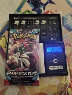 22.91g Extremely HEAVY - Pokemon TCG S&V Paradox Rift Booster Pack Sealed - Image 1