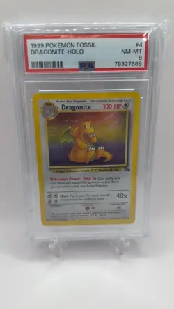 1999 POKEMON FOSSIL #4 DRAGONITE-HOLO PSA 8 - Image 1