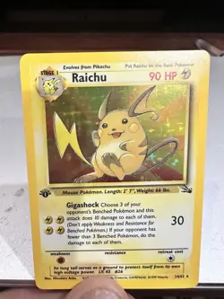 1999 Pokemon Fossil 1st Edition Raichu Holo 14/62 perfect condition - Image 1