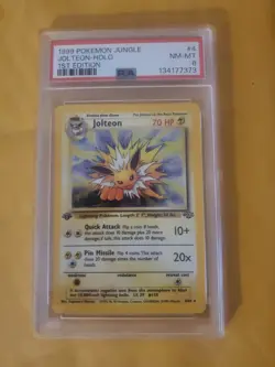 1999 Pokemon Jungle 1st Edition Jolteon Holo #4 PSA 8 - Image 1