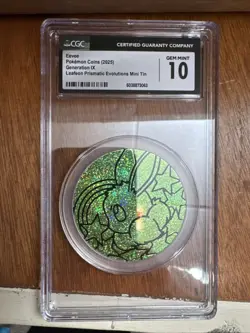 2025 Pokemon Coins Leafeon Prismatic Evolutions Mini Tin Eevee CGC 10 gen IX - Image 1