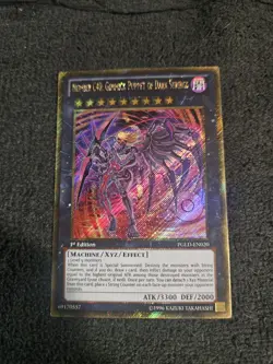 Number C40: Gimmick Puppet of Dark Strings - PGLD-EN020 - Gold Secret Rare - 1st - Image 1