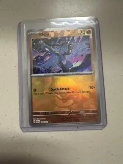 Riolu (Poke Ball Pattern) 050/131 Pokemon Sv: Prismatic Evolutions Holo - Image 1