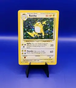 Raichu 14/102 Base Set Holo Rare Pokemon Card 1999 WOTC TCG Vintage Pokemon - Image 1