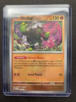 Okidogi 057/131 Reverse Holo Masterball - Pokemon Prismatic Evolutions SV8.5 - Image 1