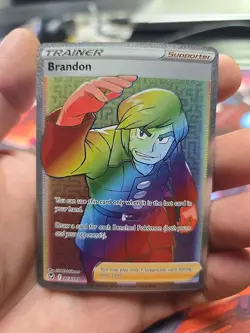Pokemon TCG - Brandon 203/195 - Silver Tempest - Rainbow Secret Rare NM/M - Image 1